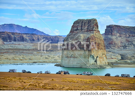 Lone Rock Monolith and RV Campers by Lake Powell Desert Shoreline 132747666