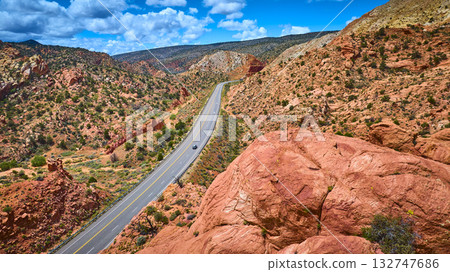 Aerial Desert Highway and Red Rock Formations in Canyon Point Utah Aerial Desert Highway and Red Rock Formations in Canyon Point Utah 132747686
