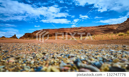 Red Sandstone Formations and Rocky Desert Terrain under Dramatic Sky Ground Level Red Sandstone Formations and Rocky Desert Terrain under Dramatic Sky Ground Level 132747776