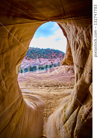 Sandstone Cave Arch with Sunlit Desert and Red Rocks Kanab Utah Interior Sandstone Cave Arch with Sunlit Desert and Red Rocks Kanab Utah Interior 132747783