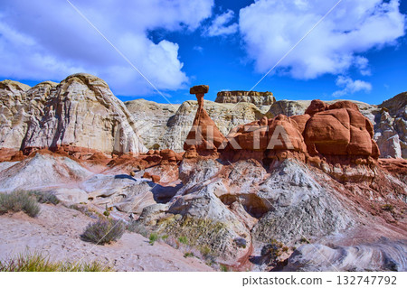 Toadstool Hoodoo and Sandstone Cliffs in Kanab Utah Desert Landscape Daytime 132747792