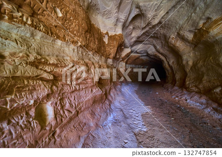 Sandstone Cave Interior with Carved Walls and Graffiti Kanab Utah Trail Entrance 132747854