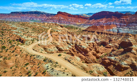 Aerial Desert Road Winding Through Red Rock Canyons and Mesas Utah 132748015