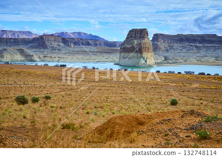Lone Rock Desert Landscape with RV Campers and Lake Powell in Utah 132748114