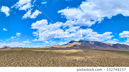 Aerial Nevada Desert Panorama With Rugged Mountains And Blue Sky Aerial Nevada Desert Panorama With Rugged Mountains And Blue Sky 132748237