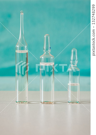 glass ampoules with liquid medical medicine 132748299