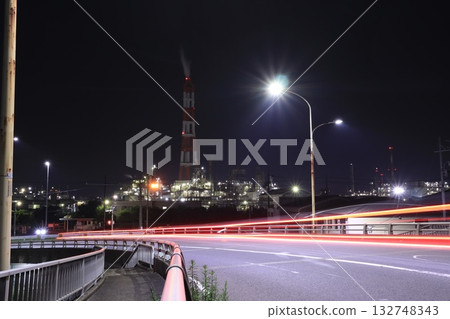 Factory night view seen across the road Factory night view seen across the road 132748343