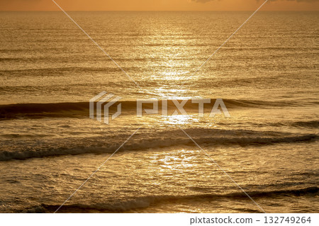 The beautiful shape of the golden ocean [with sunrise sunlight] 132749264