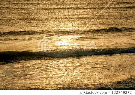 The beautiful shape of the golden ocean [with sunrise sunlight] 132749272