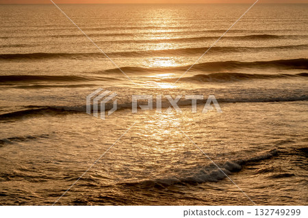 The beautiful shape of the golden ocean [with sunrise sunlight] 132749299