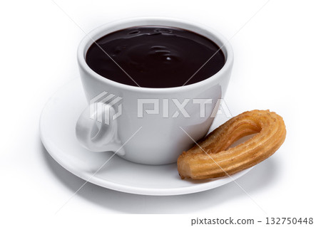 Spanish churros with hot thick chocolate in a white cup 132750448