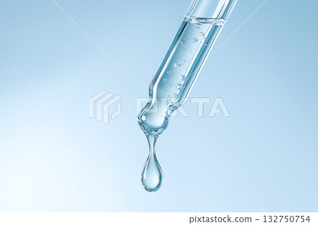 Close-up of a dropper dripping with a light blue, transparent beauty serum. Image for advertising moisturizing beauty ingredients and skin care. Close-up of a dropper dripping with a light blue, transparent beauty serum. Image for advertising moisturizing beauty ingredients and skin care. 132750754