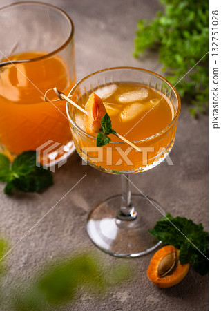 Fresh apricot Bellini cocktail with mint 132751028