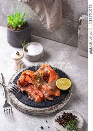 Salted sliced salmon fish with herbs Salted sliced salmon fish with herbs 132751056