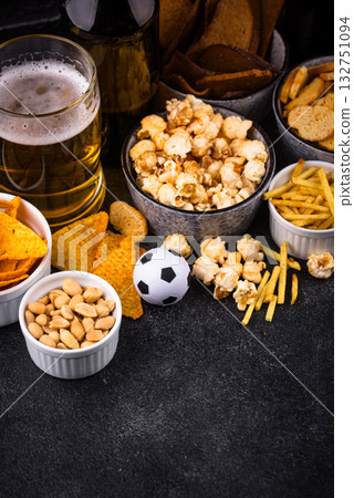 Beer and different snacks for Superbowl or football party Beer and different snacks for Superbowl or football party 132751094