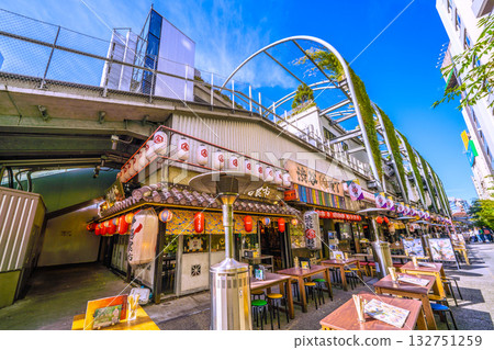Tokyo cityscape in Japan in November. Warm sunshine in front of Shibuya Station. Overlooking Shibuya Yokocho, bustling with foreign tourists. (4th) 132751259