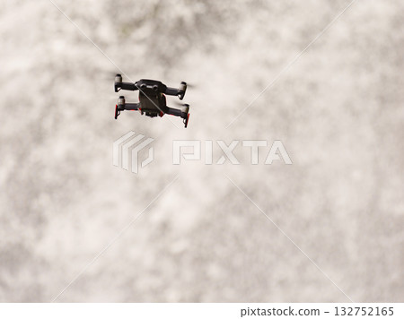 Drone flying against river waterfall Drone flying against river waterfall 132752165