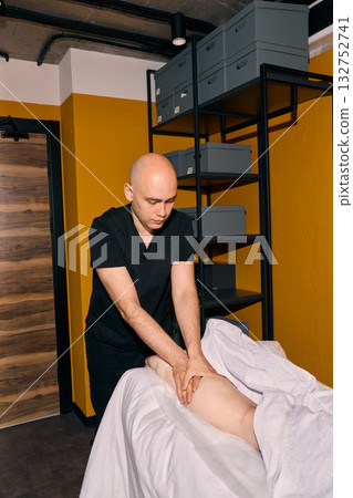Enjoy a Professional Massage Therapy Session in our Contemporary Studio for relaxation 132752741