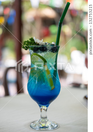 Blue lemonade served in a glass with lemon 132753215