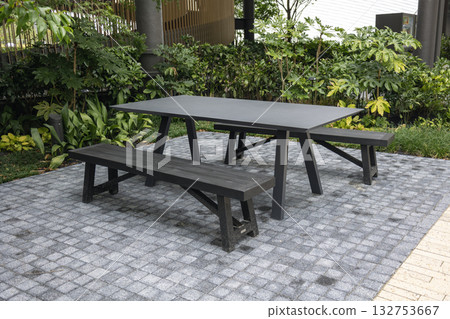 Outdoor table and wooden chairs Outdoor table and wooden chairs 132753667