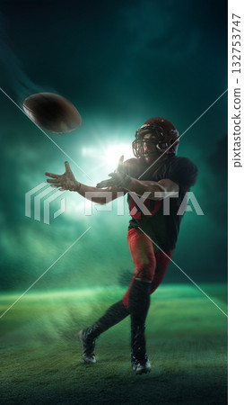 Digital artwork. Football player jumping for ball on illuminated field with blur motion effect. Digital artwork. Football player jumping for ball on illuminated field with blur motion effect. 132753747