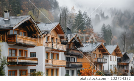 Picturesque austrian mountain village with traditional wooden homes nestled in nature s embrace 132754382