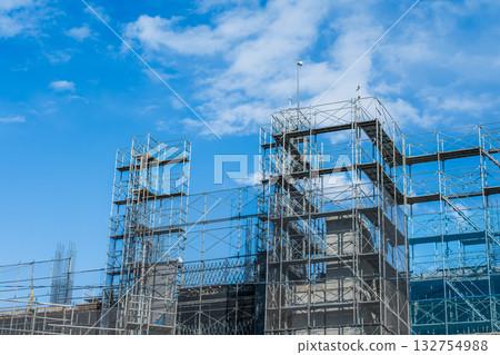 Blue sky and condominium construction site Blue sky and condominium construction site 132754988