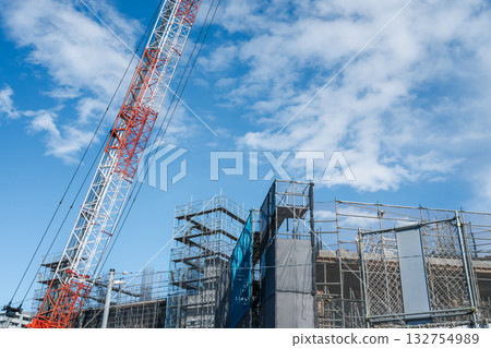 Crane and condominium construction site Crane and condominium construction site 132754989
