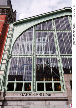 Solar panels integrated into windows on facade of the Gare Maritime former railway station on the Tour and Taxis site in Brussels, Belgium 132755163