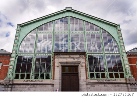Solar panels integrated into windows on facade of the Gare Maritime former railway station on the Tour and Taxis site in Brussels, Belgium Solar panels integrated into windows on facade of the Gare Maritime former railway station on the Tour and Taxis site in Brussels, Belgium 132755167
