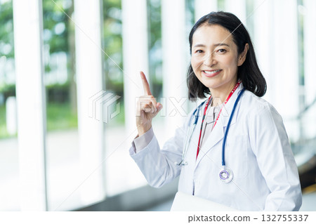 A middle-aged female doctor. A middle-aged female doctor. 132755337