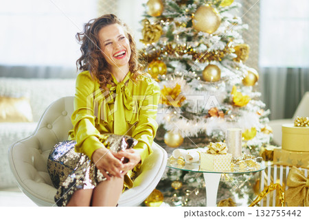 Laughing Woman in Green Sequin at Christmas Celebration 132755442