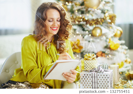 Woman Reflects on Holiday Plans with Eyes Closed 132755451