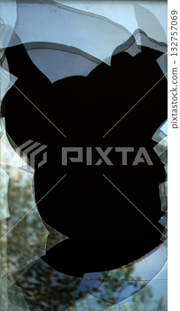 Kyiv, Ukraine, October 13, 2025: Broken window glass of a high-rise building 132757069