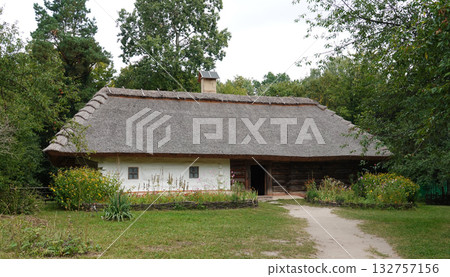 Kyiv, Ukraine, September 1, 2025: An ancient Ukrainian house in the Pirogovo National Museum of Folk Architecture and Rural Life of Ukraine in Kyiv 132757156