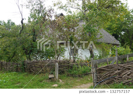 Kyiv, Ukraine, September 1, 2025: An ancient Ukrainian house in the Pirogovo National Museum of Folk Architecture and Rural Life of Ukraine in Kyiv Kyiv, Ukraine, September 1, 2025: An ancient Ukrainian house in the Pirogovo National Museum of Folk Architecture and Rural Life of Ukraine in Kyiv 132757157