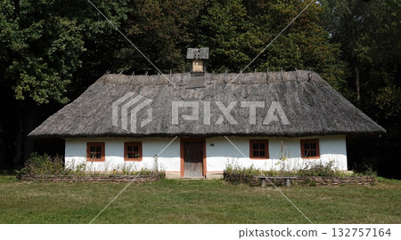 Kyiv, Ukraine, September 1, 2025: An ancient Ukrainian house in the Pirogovo National Museum of Folk Architecture and Rural Life of Ukraine in Kyiv 132757164