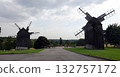 Kyiv, Ukraine, September 1, 2025: Ancient mills in the open-air museum of folk architecture and everyday life of Ukraine 132757172