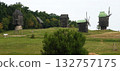 Kyiv, Ukraine, September 1, 2025: Ancient mills in the open-air museum of folk architecture and everyday life of Ukraine 132757175