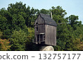 Kyiv, Ukraine, September 1, 2025: Ancient mills in the open-air museum of folk architecture and everyday life of Ukraine 132757177