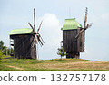 Kyiv, Ukraine, September 1, 2025: Ancient mills in the open-air museum of folk architecture and everyday life of Ukraine 132757178