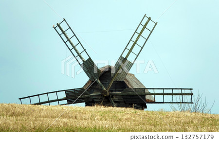 Kyiv, Ukraine, September 1, 2025: Ancient mills in the open-air museum of folk architecture and everyday life of Ukraine 132757179