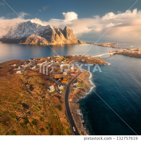 Aerial view of Reine village, fjords and snowy mountains 132757619
