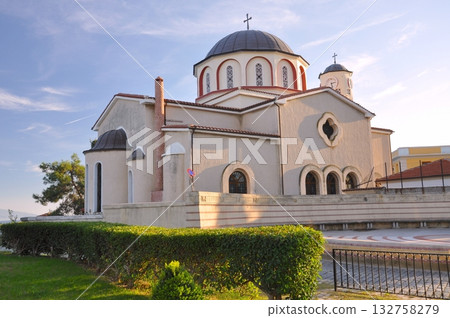 Church of the Assumption illuminated by the setting sun, Kavala, Greece Church of the Assumption illuminated by the setting sun, Kavala, Greece 132758279