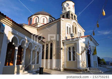 Facade of the Church of the Assumption illuminated by the setting sun, Kavala, Greece Facade of the Church of the Assumption illuminated by the setting sun, Kavala, Greece 132758281