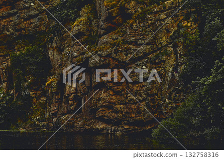 Evening rock granite canyon and calm river 132758316