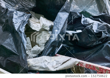 Construction waste.Polypropylene filled bags with garbage.Cleaning Construction waste.Polypropylene filled bags with garbage.Cleaning 132758622