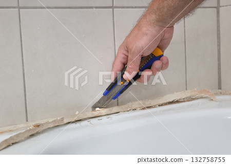 Bathroom renovation, old silicone removal 132758755
