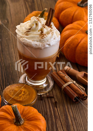 Autumn Pumpkin Spice Latte. A cozy autumn drink with whipped cream, cinnamon 132760096