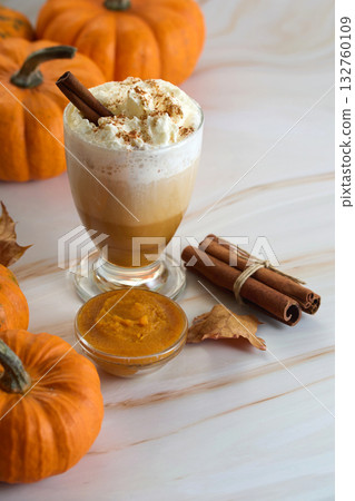 Autumn Pumpkin Spice Latte whipped cream and cinnamon 132760109